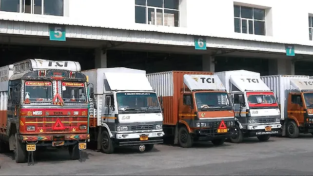 TCI Trucks At A Logistics Facility In India TCI Trucks At A Logistics Facility In India