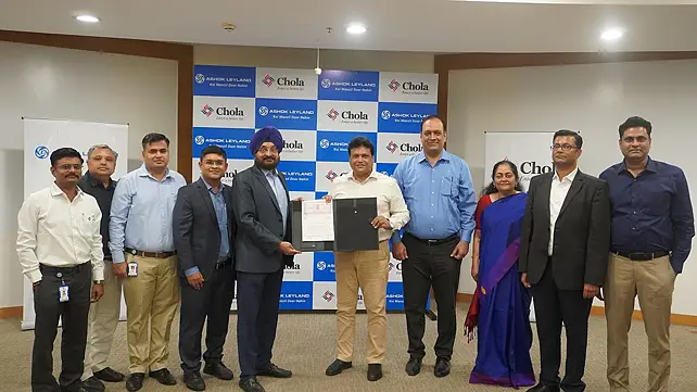 Ashok Leyland and Cholamandalam Investment and Finance Company officials Ashok Leyland and Cholamandalam Investment and Finance Company officials