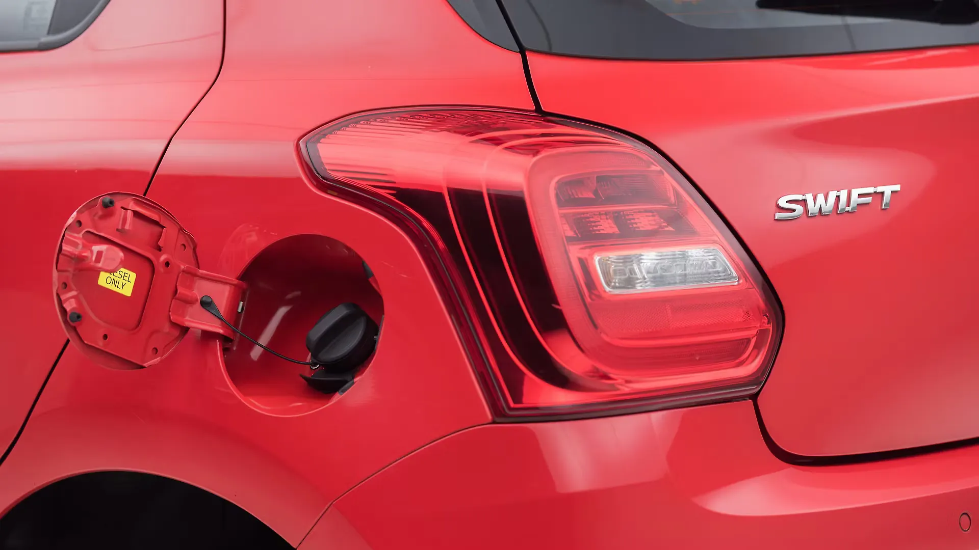 Swift Open Fuel Lid Image, Swift Photos in India CarWale