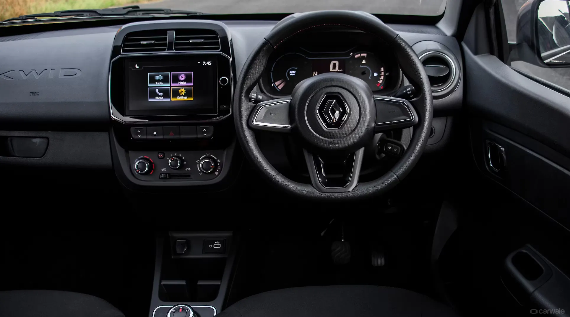 Kwid Steering Wheel Music System Image, Kwid Photos in India CarWale