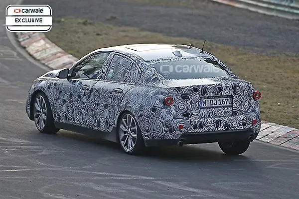 BMW 1 Series sedan spied testing at Nurburgring - CarWale