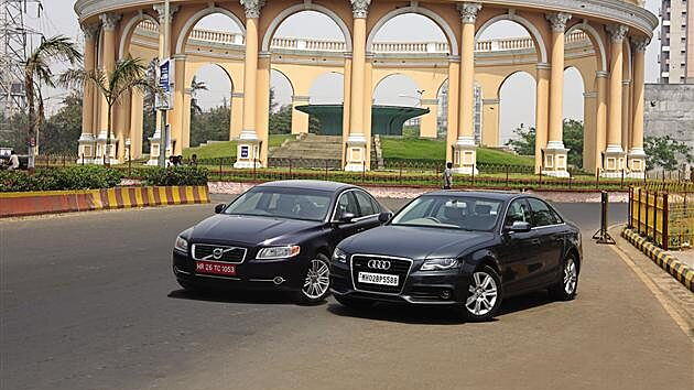 Audi A4 and Volvo S80