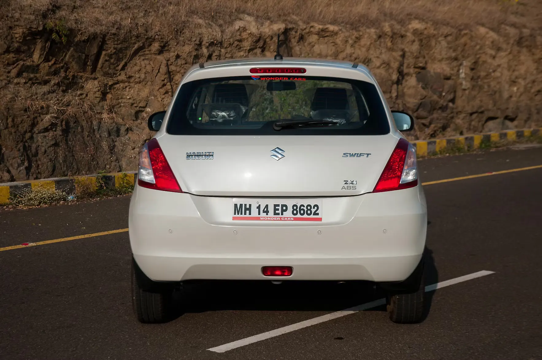 Rear view Image, Maruti Suzuki Swift Photo CarWale