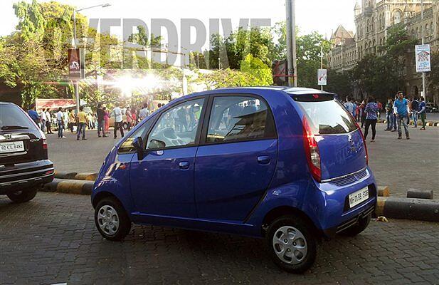 2013 facelifted Tata Nano spied during shoot for TV commercial - CarWale