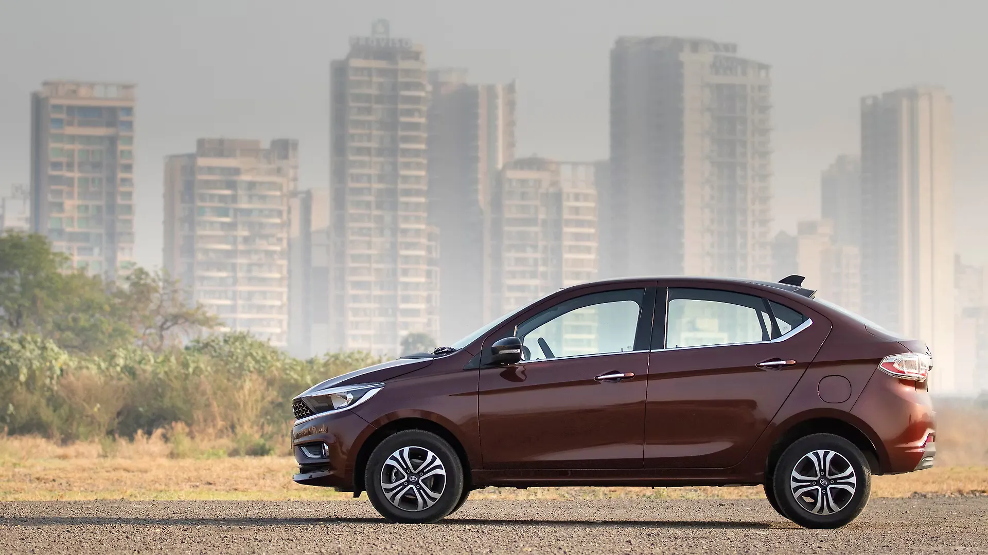 https://imgd.aeplcdn.com/0x0/n/cw/ec/41160/tigor-exterior-left-side-view.jpeg?isig=0