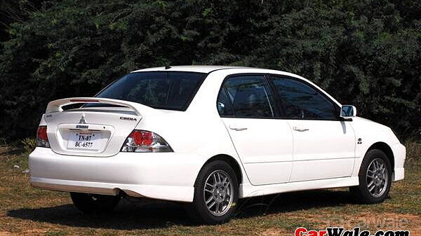 Mitsubishi Cedia [2009-2013] Left Rear Three Quarter