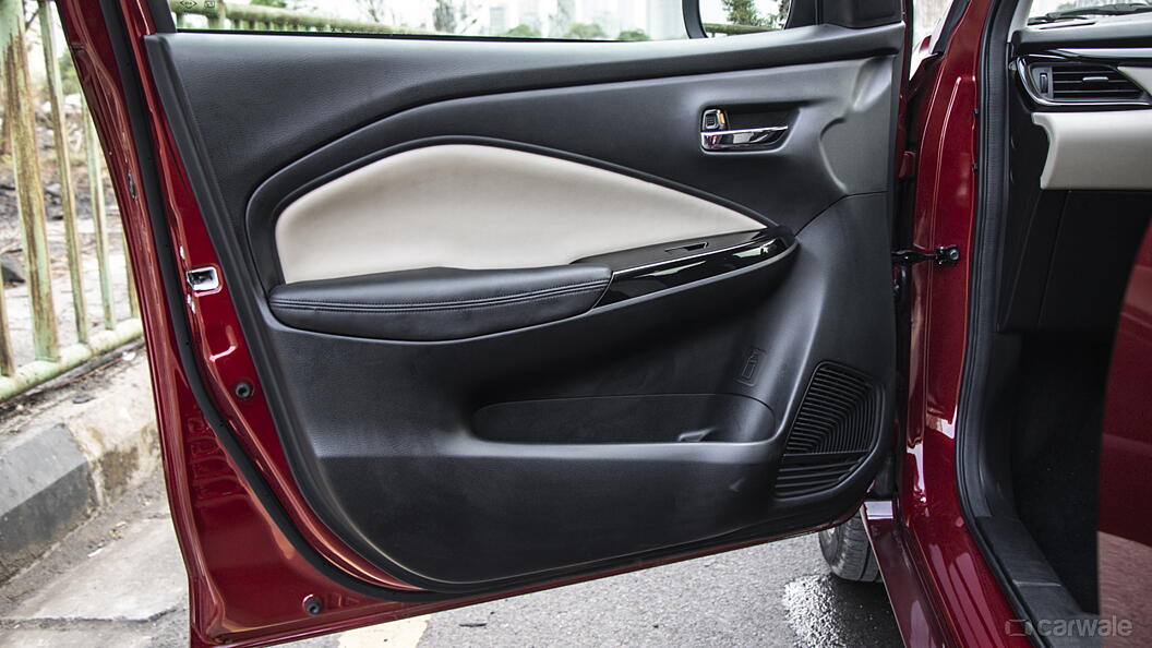 Glanza Front Left Door Pad Image, Glanza Photos in India - CarWale