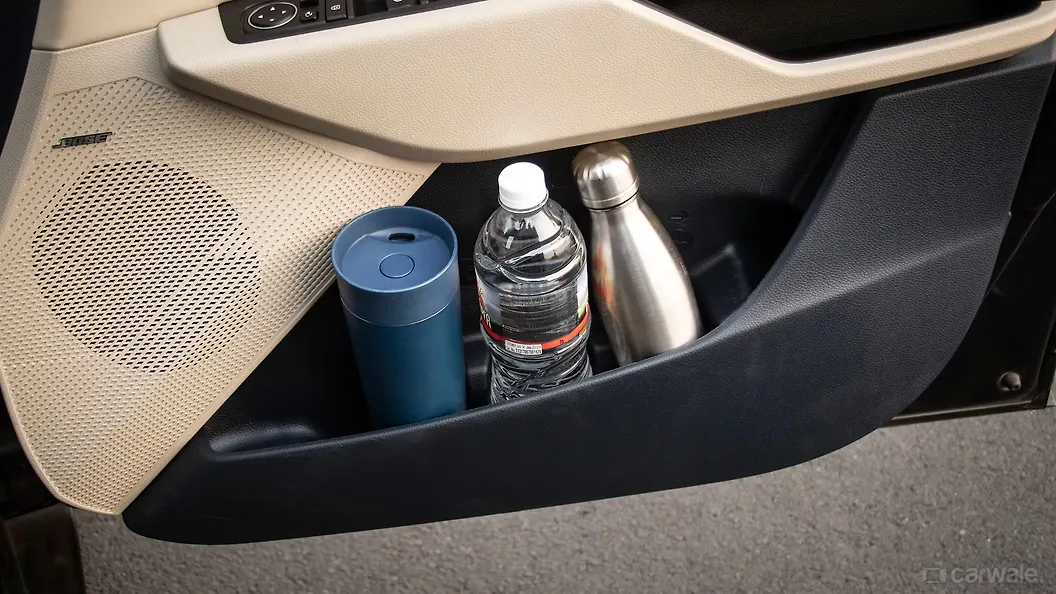 Carens Driver Side Front Door Pocket Image, Carens Photos in India