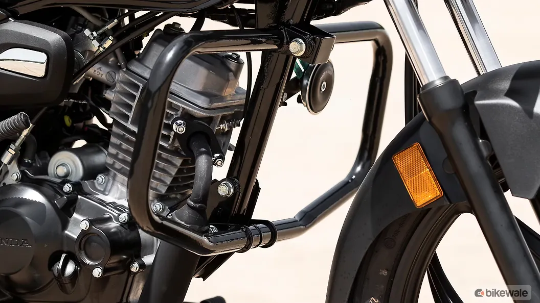 Honda Shine 100 Front Leg Guard Image BikeWale