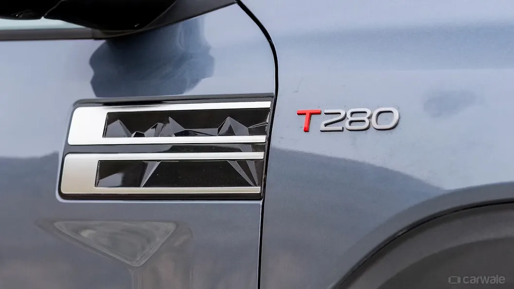 Nissan Tekton Side Badge