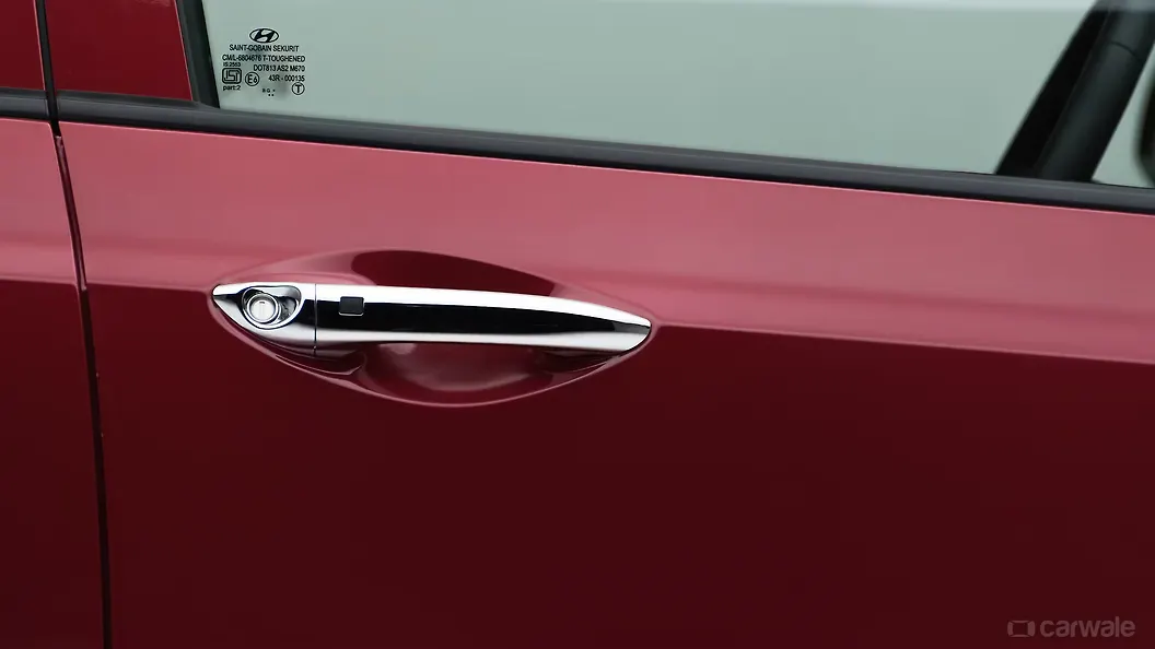 Grand i10 Front Door Handle Image, Grand i10 Photos in India CarWale