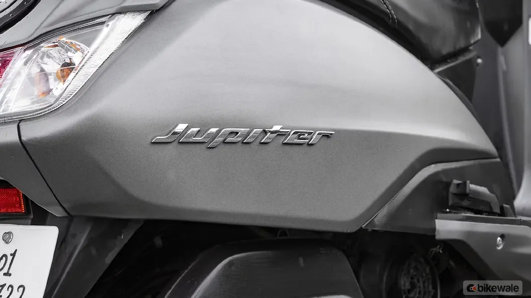 TVS Jupiter Left Side Body Panel Badge Image BikeWale