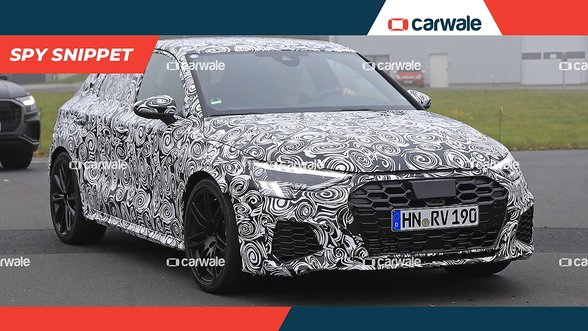 New Audi RS3 spied hiding its aggressive styling - CarWale