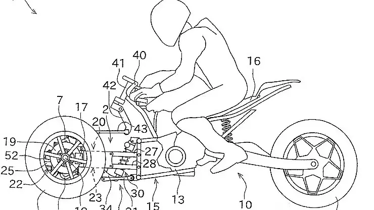 Kawasaki working on motorcycle with three wheels Kawasaki working on motorcycle with three wheels