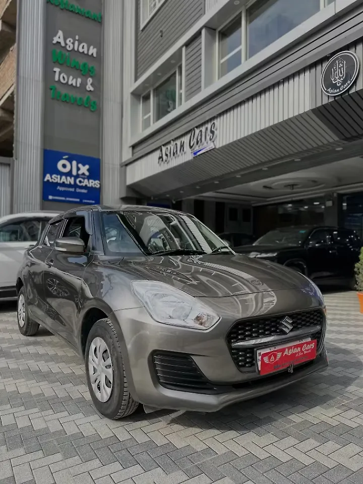 2023 Maruti Suzuki Swift VXi 1