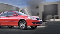 Mitsubishi Cedia [2009-2013] Right Front Three Quarter