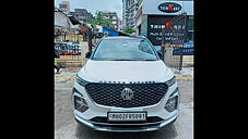 Used MG Hector Plus Sharp 1.5 Petrol Turbo Hybrid MT 6-STR Dual Tone in Mumbai