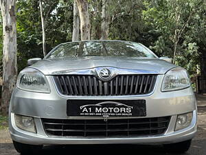 Second Hand Skoda Rapid 1.5 TDI CR Ambition AT with Alloy Wheels in Pune