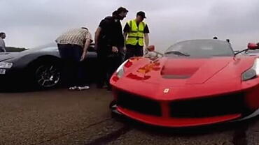 Watch this epic hypercar battle between Bugatti Veryon and LaFerrari