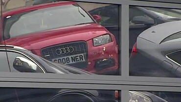 20 cars fall through Audi dealership