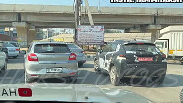 Maruti’s Coupe SUV spied alongside old Baleno