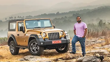 Jeep Wrangler vs Mahindra Thar - CarWale