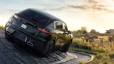 Porsche E-Macan teased; deliveries to begin in 2024