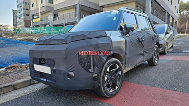 Kia Clavis continues testing; interior spied - CarWale