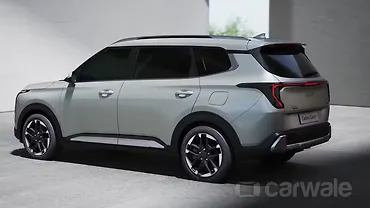 Kia Carens Clavis Left Rear Three Quarter