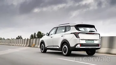 किआ कारेन्स क्लाविस ईवी लेफ्ट रियर थ्री क्वार्टर