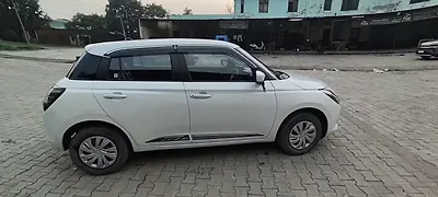 2024 Maruti Suzuki Swift VXi Petrol Automatic 1 2024 Maruti Suzuki Swift VXi Petrol Automatic 1