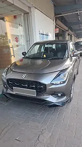 2024 Maruti Suzuki Swift VXi (O) Petrol Automatic 1 2024 Maruti Suzuki Swift VXi (O) Petrol Automatic 1