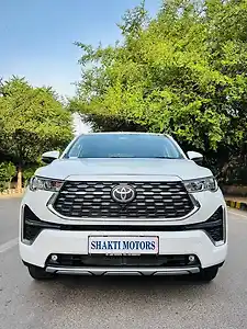 2026 टोयोटा इनोवा हायक्रॉस VX Hybrid (Electric + Petrol) Automatic (e-CVT) 8 STR Platinum White Pearl 1 2026 टोयोटा इनोवा हायक्रॉस VX Hybrid (Electric + Petrol) Automatic (e-CVT) 8 STR Platinum White Pearl 1