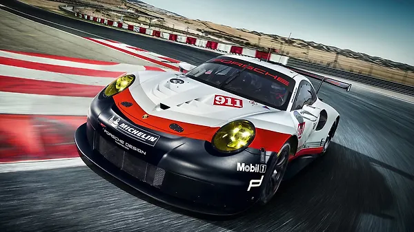 Porsche unveils the mid-engine 911 RSR - CarWale