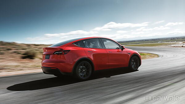 Tesla Model Y mid-size electric SUV breaks cover; likely range of 482km -  CarWale