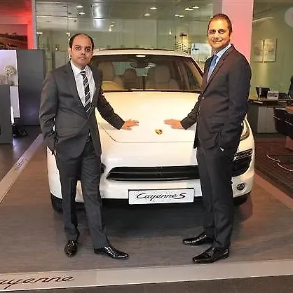 porsche inaugurates a new dealership in ahmedabad carwale