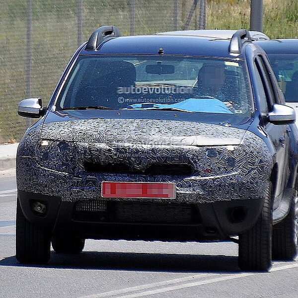Facelifted Dacia Duster spotted testing in Spain - CarWale