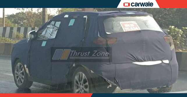 Production-spec Mahindra S201 test mule image surface - CarWale