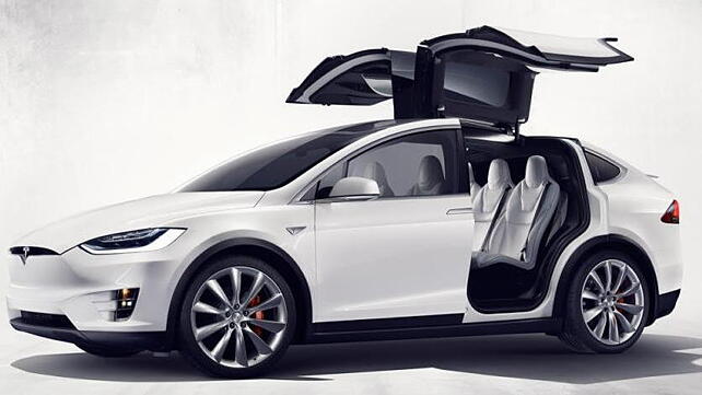 Tesla officially unveils Model X electric crossover