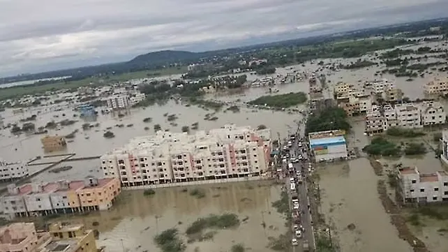 Chennai rains hit auto companies badly, production halted Chennai rains hit auto companies badly, production halted