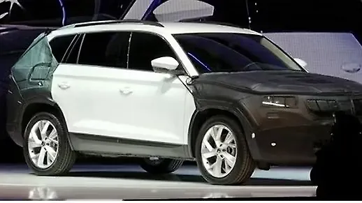 Skoda showcases camouflaged Kodiaq SUV at media event Skoda showcases camouflaged Kodiaq SUV at media event