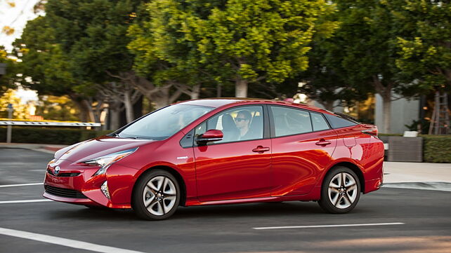 Toyota recalls Prius over parking brake problem, stops sales