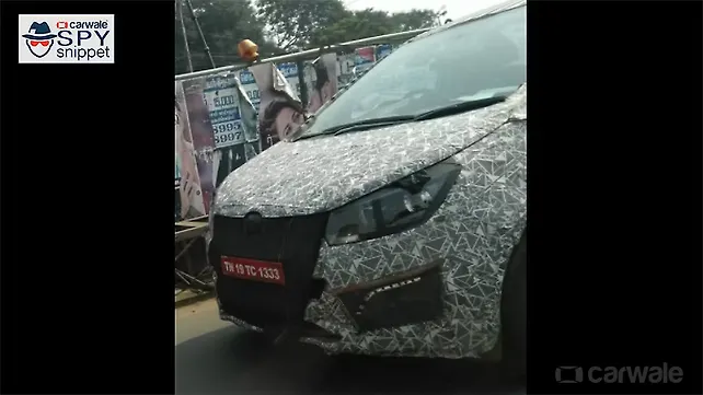 Mahindra’s upcoming MPV spotted testing with production headlamps Mahindra’s upcoming MPV spotted testing with production headlamps