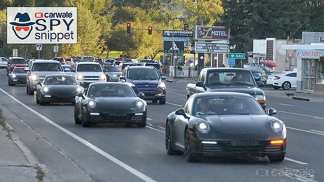 New-gen Porsche 911 spied in convoy with digital instrument cluster New-gen Porsche 911 spied in convoy with digital instrument cluster