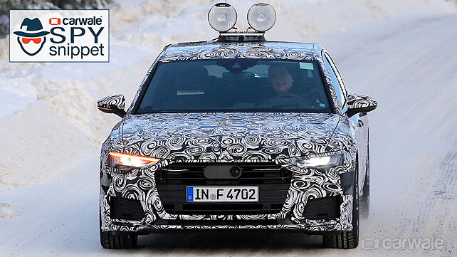 New-gen Audi A6 spotted in snow with production headlamps