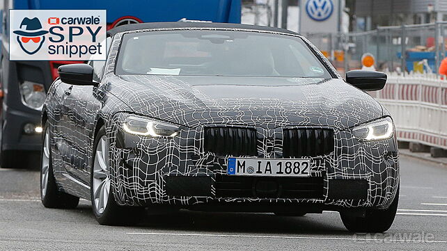 BMW 8 Series Cabriolet continues testing with lesser camouflage