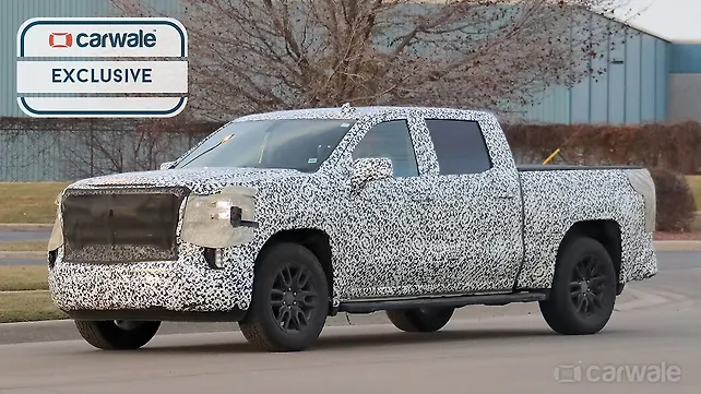 2019 GMC Sierra seen in multiple trims 2019 GMC Sierra seen in multiple trims