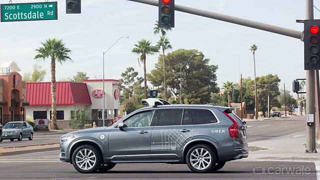 Uber suspends self-driving tests after vehicle hits pedestrian