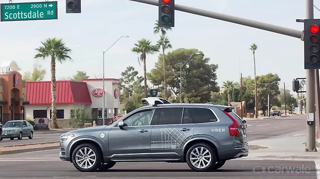 Uber suspends self-driving tests after vehicle hits pedestrian Uber suspends self-driving tests after vehicle hits pedestrian