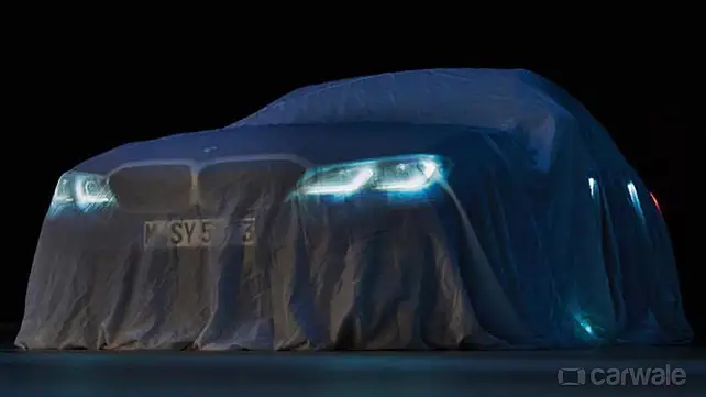 New-gen BMW 3 Series teased under the veil for Paris debut New-gen BMW 3 Series teased under the veil for Paris debut